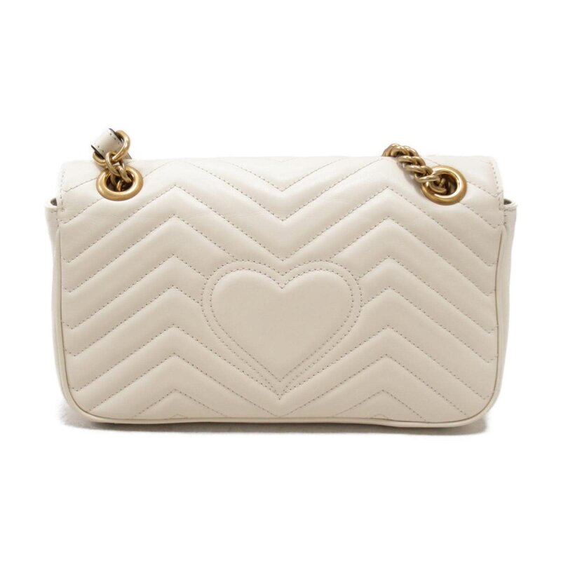 GUCCI GUCCI GG MARMONT SMALL LEATHER MATELASSE SHOULDER BAG IVORY WHITE