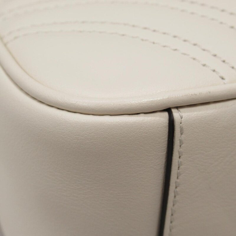 GUCCI GUCCI GG MARMONT SMALL LEATHER MATELASSE SHOULDER BAG IVORY WHITE