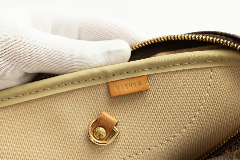 Louis Vuitton Monogram Alize 24 Heures Luggage