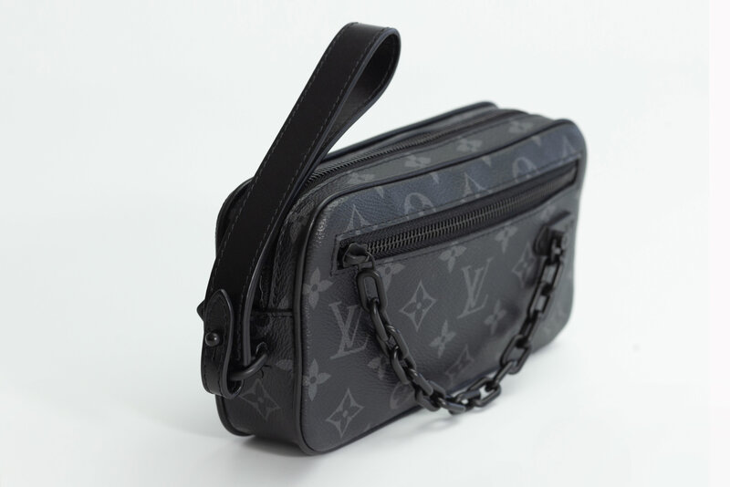 LOUIS VUITTON LOUIS VUITTON MONOGRAM ECLIPSE POCHETTE VOLGA WRISTLET BAG