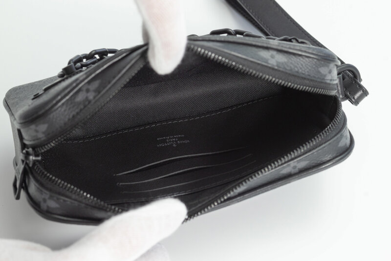 LOUIS VUITTON LOUIS VUITTON MONOGRAM ECLIPSE POCHETTE VOLGA WRISTLET BAG