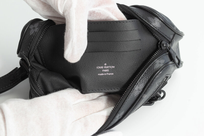 LOUIS VUITTON LOUIS VUITTON MONOGRAM ECLIPSE POCHETTE VOLGA WRISTLET BAG