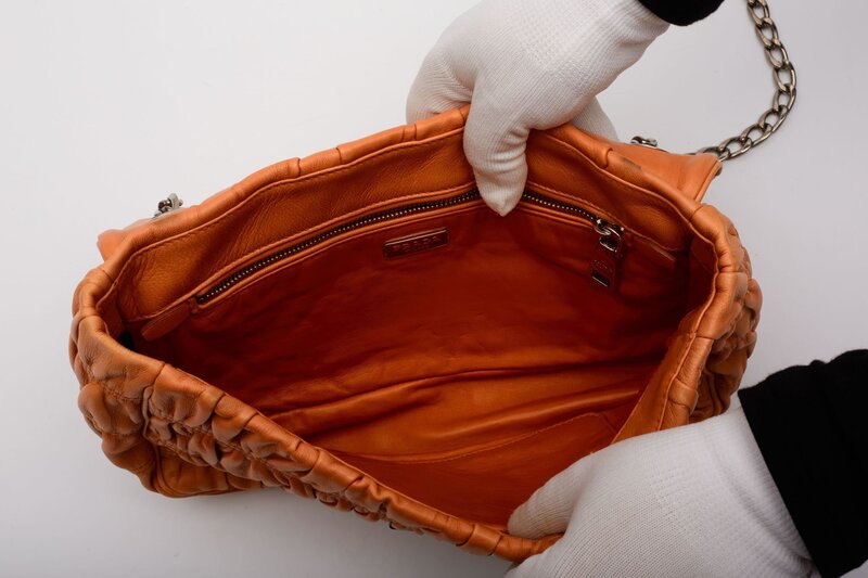 PRADA PRADA NAPPA GAUFRE LEATHER ORANGE SOUND CHAIN SHOULDER BAG