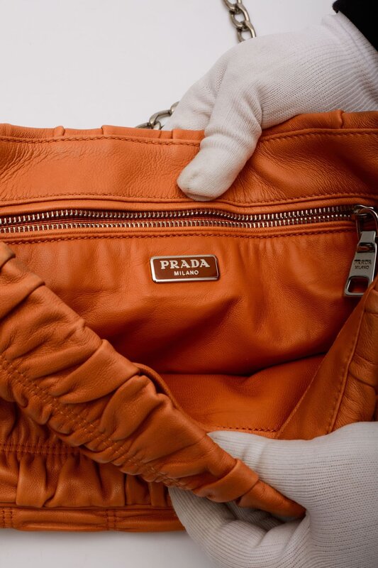 PRADA PRADA NAPPA GAUFRE LEATHER ORANGE SOUND CHAIN SHOULDER BAG