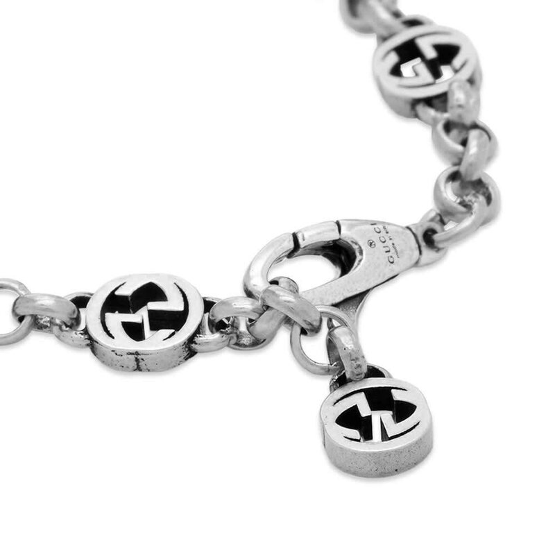GUCCI GUCCI STERLING SILVER INTERLOCKER G HEART PENDANT BRACELET