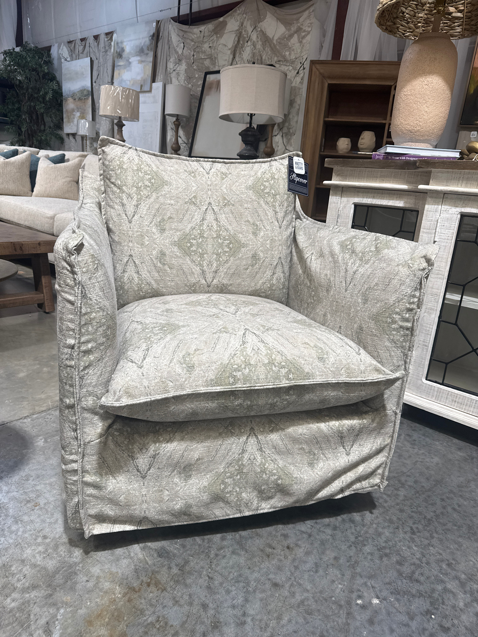 Four Seasons Mona Swivel Glider in Sephora Spanish Moss