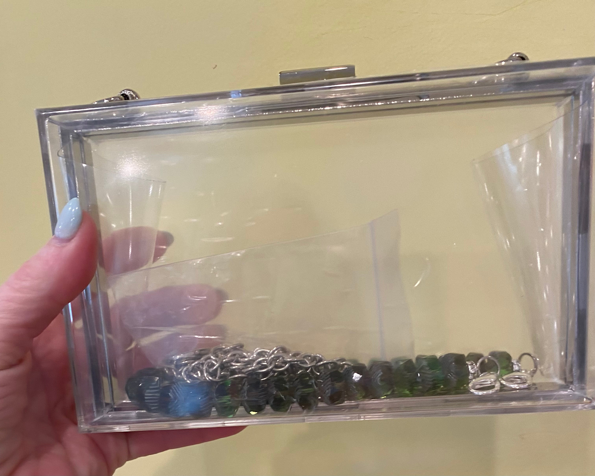 Accessories ACRYLIC CLUTCH WITH GREEN BEAD HANDLE