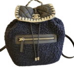 Wyld Blue Vintage Chanel Black and Navy Shearling Backpack