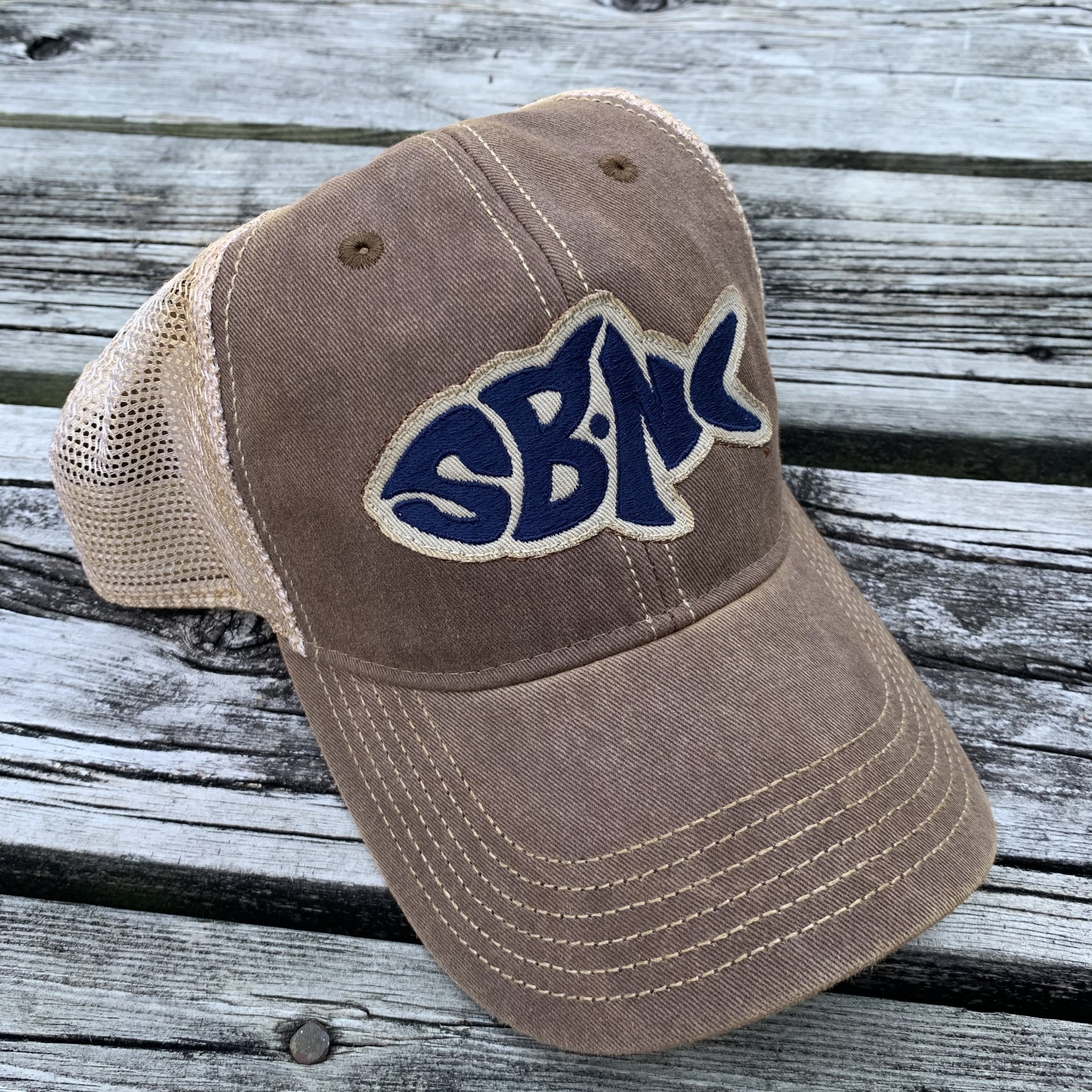 https://cdn.shoplightspeed.com/shops/640525/files/33527217/sbnc-fish-logo-sbnc-fish-ofa-trucker-cap-brown.jpg