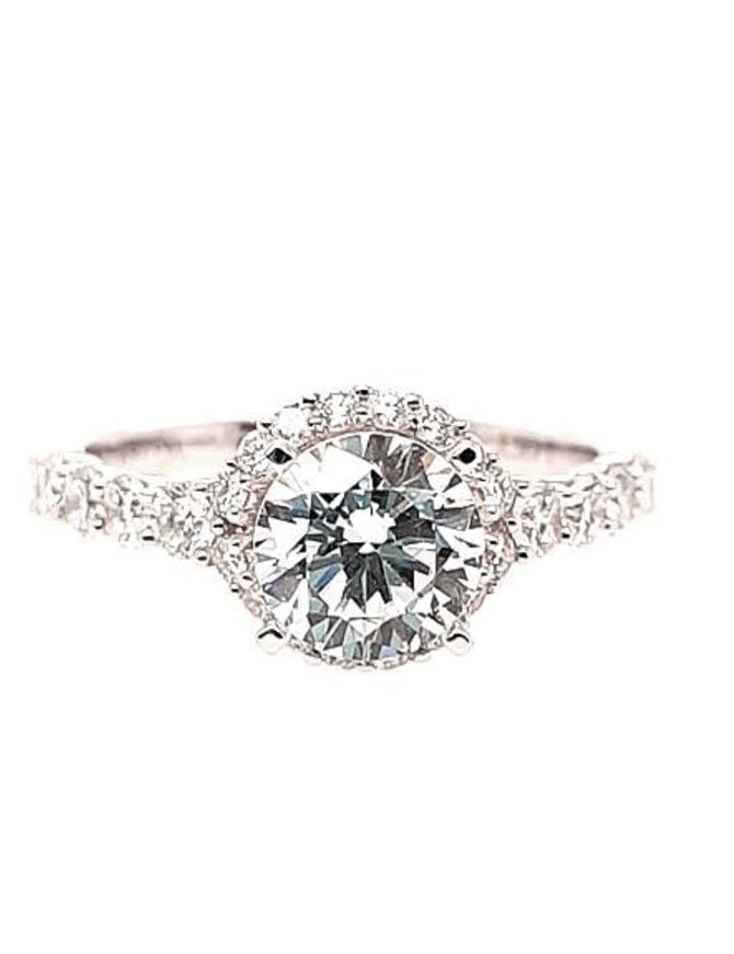 Diamond (0.56 ctw) halo setting, 14k white gold, shown with a cz center