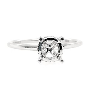 Diamond (0.11 ctw) solitaire with fancy head, 14k white gold