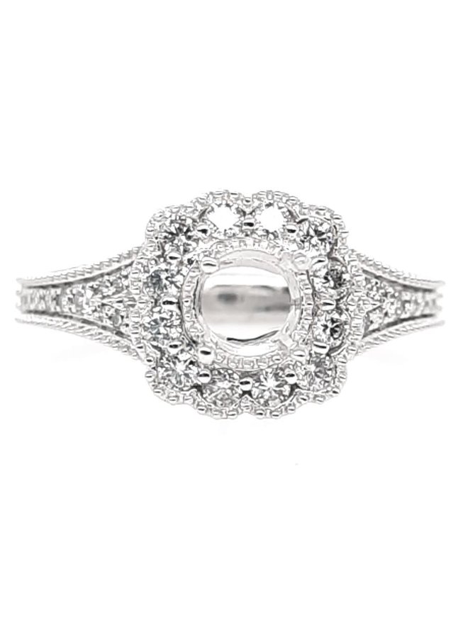 Diamond (0.38 ctw) halo with beaded setting, platinum