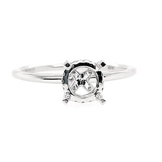 Diamond (0.14 ctw) solitaire with fancy head setting, 14k white gold