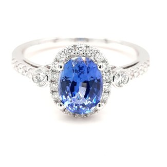 Sapphire (1.46 ct) And Diamond  (0.30 ctw) Halo Ring