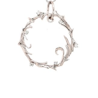TQ original diamond swirl circle pendant. 14k white gold