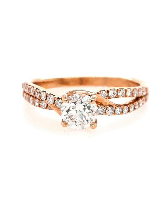Diamond (0.59 ct center H/VS1, 0.87 ctw) engagement ring, 14k yellow gold