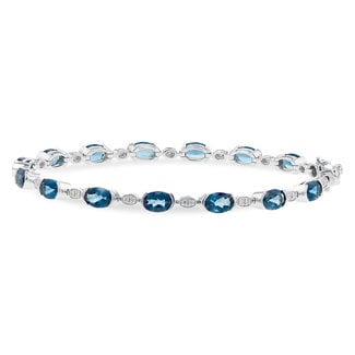 London blue topaz (7.20ctw) diamond (0.16ctw) bracelet, 14k white gold