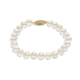 White pearl (6-6.5mm) 7" bracelet 14k yellow gold clasp
