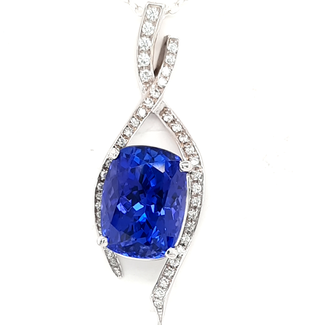 TQ tanzanite (11.47 ct) & diamond (0.50 ctw) pendant 14k white gold 6.5 gr