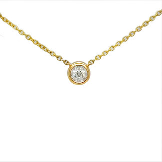 Diamond (0.15ct) bezel set pendant, 14k yellow gold