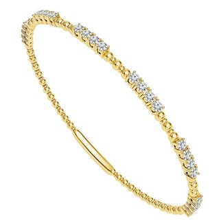 Diamond (7/8 ctw) flexible bangle w/titanium wire 14k yellow gold