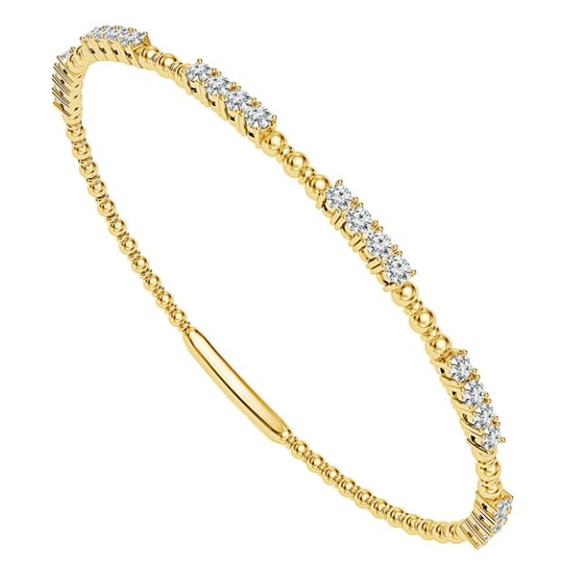 Diamond (7/8 ctw) flexible bangle w/titanium wire 14k yellow gold
