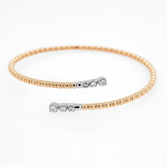 Diamond (0.33 ctw) bypass style bangle bracelet 14k yellow & white gold 7.2 gr