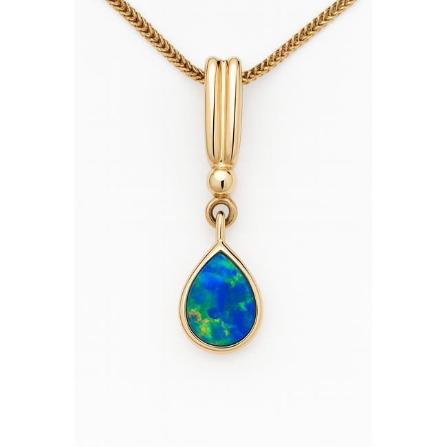 Opal doublet (0.20 ct) pear shape pendant 14k yellow gold