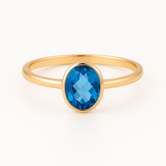 Blue topaz (2.22 ct) oval checkerboard cut bezel set solitaire ring 18k yellow gold