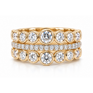 Diamond (0.92ctw) 3-row bezel ring 14k wg & plat. 750 4.7g