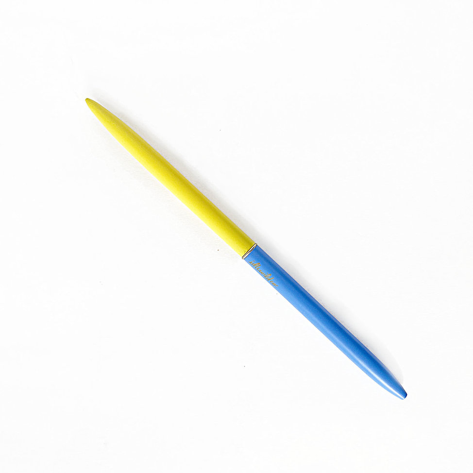 https://cdn.shoplightspeed.com/shops/640622/files/53739796/974x974x1/idlewild-co-duotone-slim-pen-yellow-blue.jpg