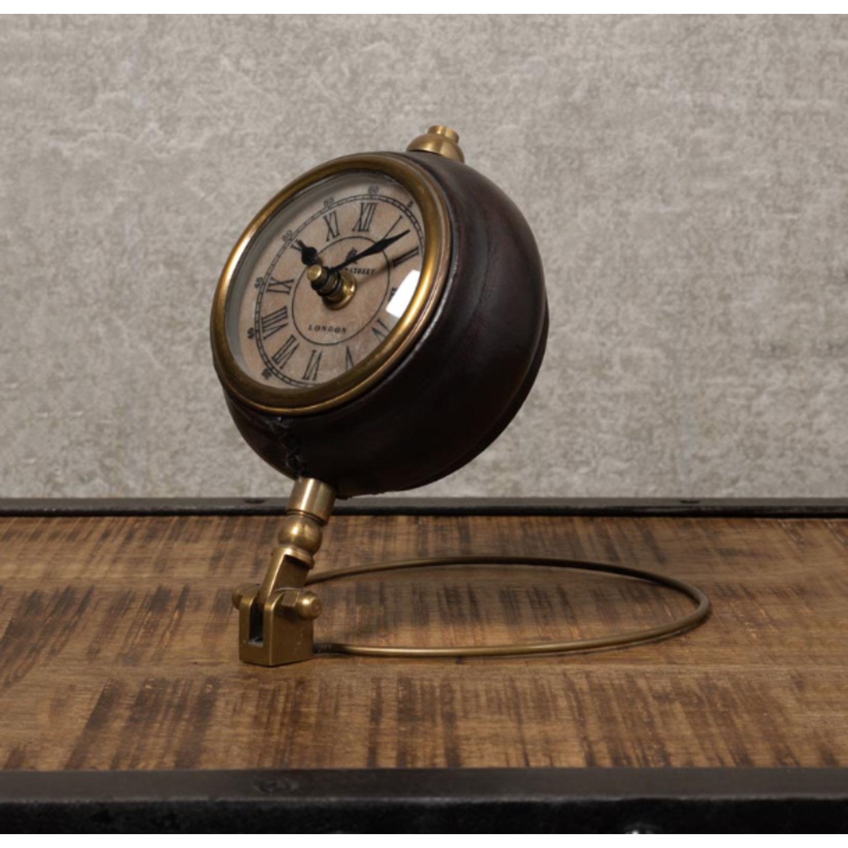 CHEHOMA ROUND LEATHER CLOCK ON BRASS STAND