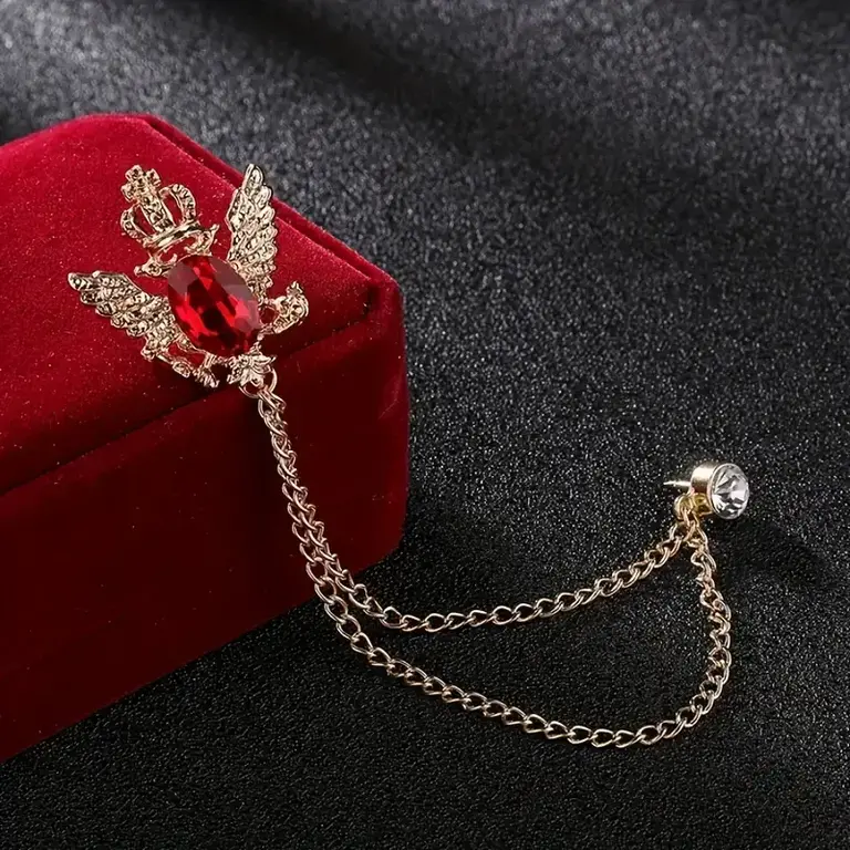 Ecliff Elie Golden Crown/Wing Brooch with Red Stone