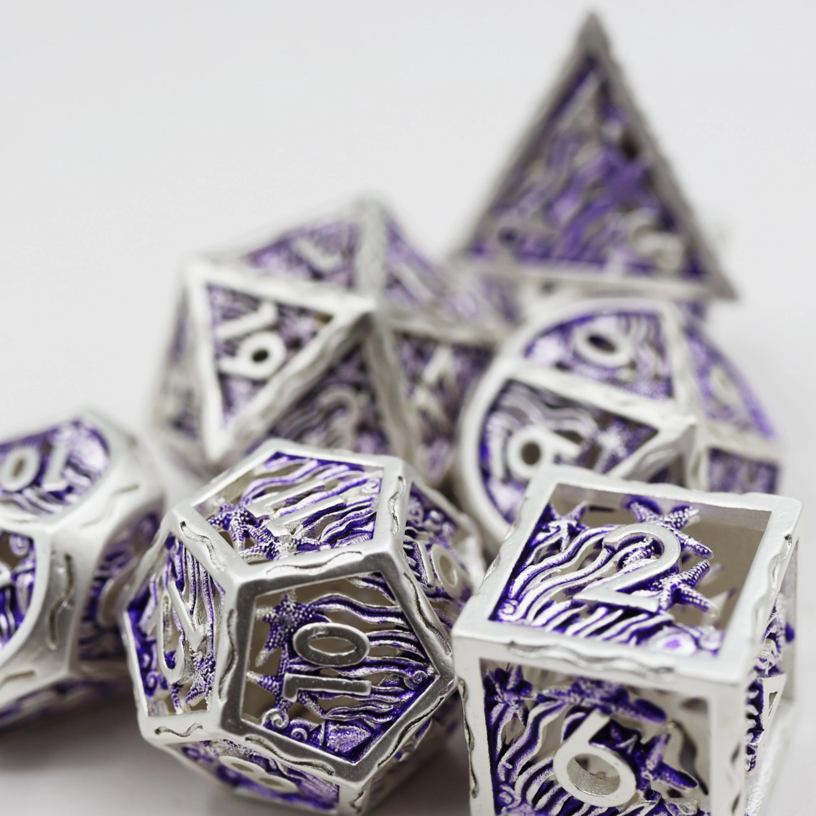 Foam Brain Games Hollow Seascape Silver and Purple RPG Metal Dice 7 die set