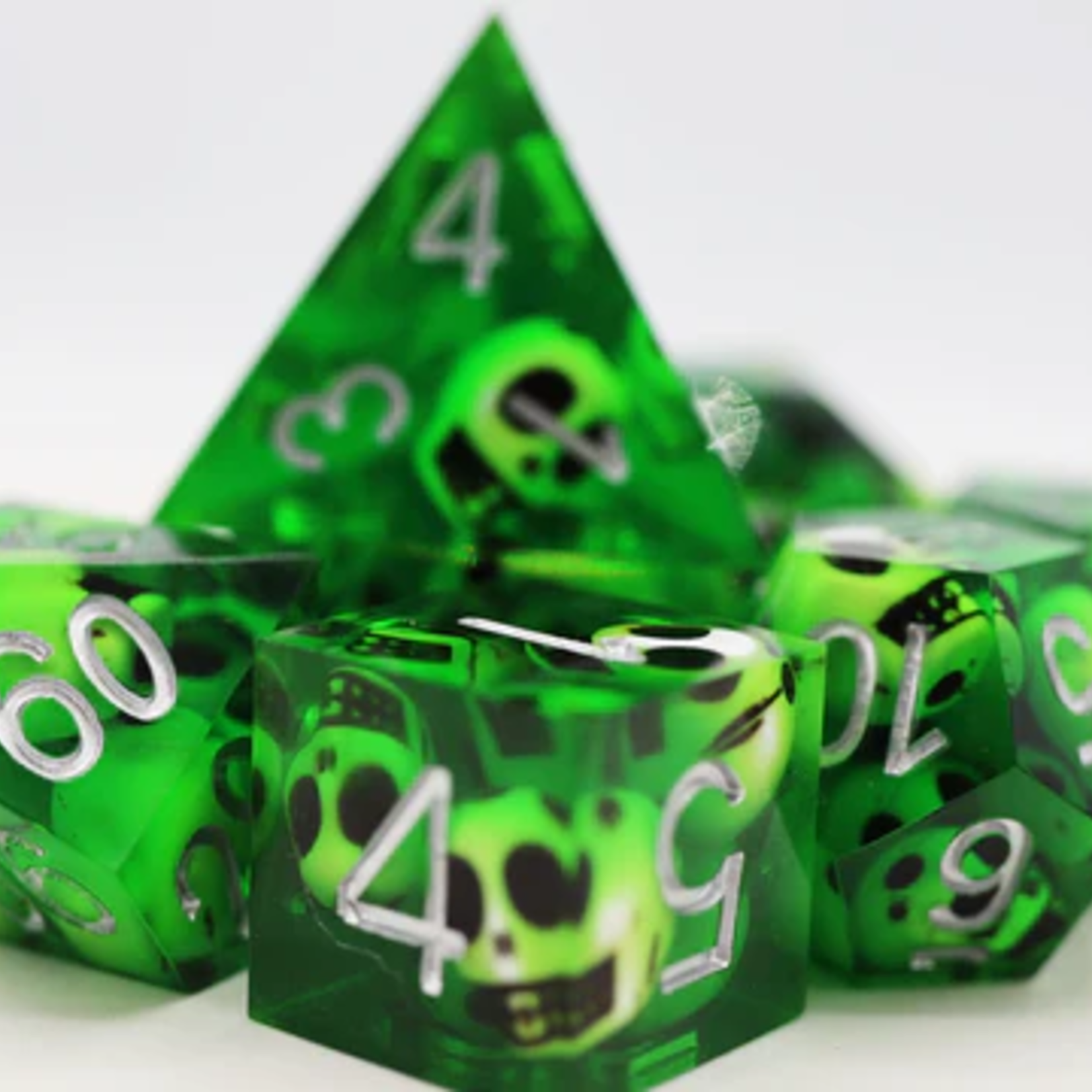 Foam Brain Games Sharp Edge Green Skulls Resin RPG Dice 7 die set