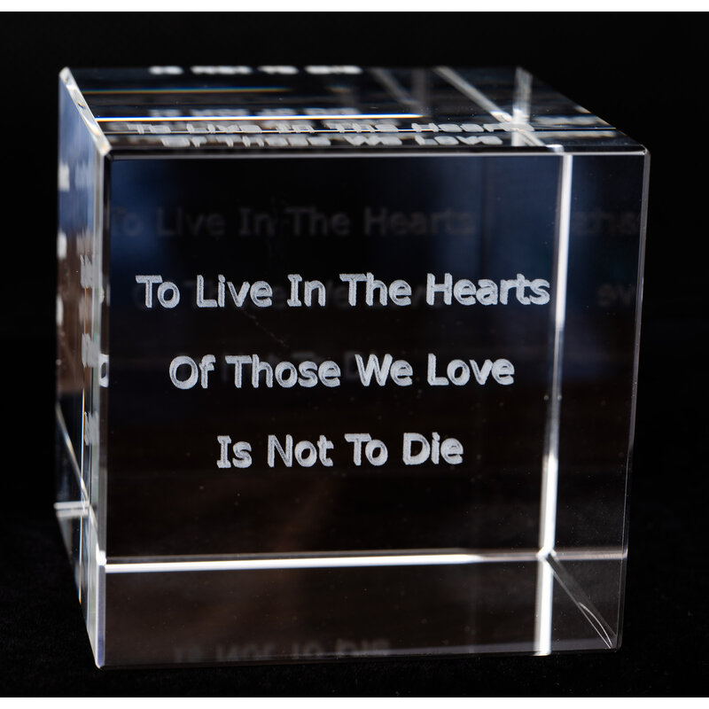 "To live in the hearts..." Paperweight