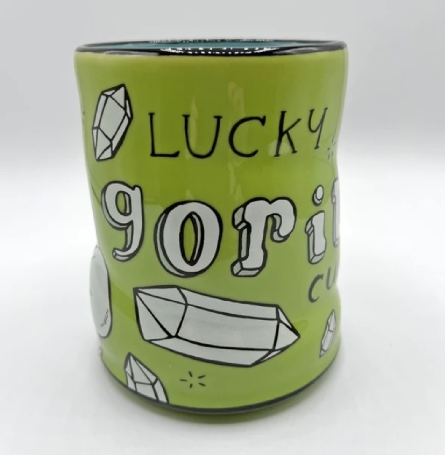 https://cdn.shoplightspeed.com/shops/641068/files/51184131/1500x4000x3/the-bowl-maker-lucky-cup-gorilla-16-oz.jpg