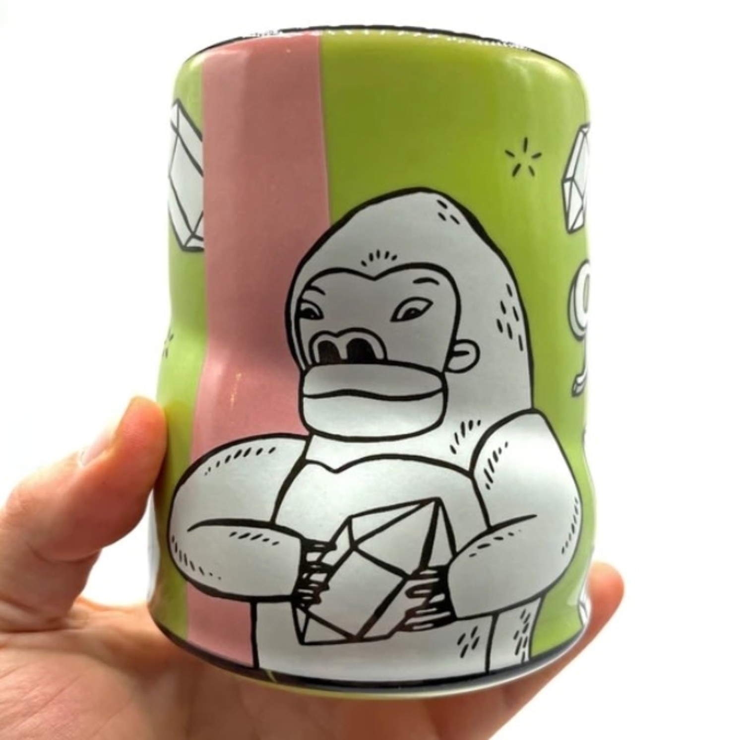 https://cdn.shoplightspeed.com/shops/641068/files/51184136/1500x4000x3/the-bowl-maker-lucky-cup-gorilla-16-oz.jpg
