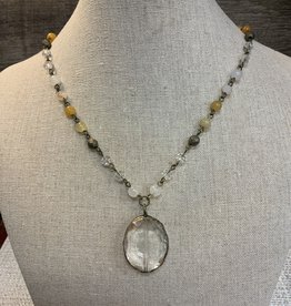 - Oval Crystal Pendant Earth Tone Beaded Necklace