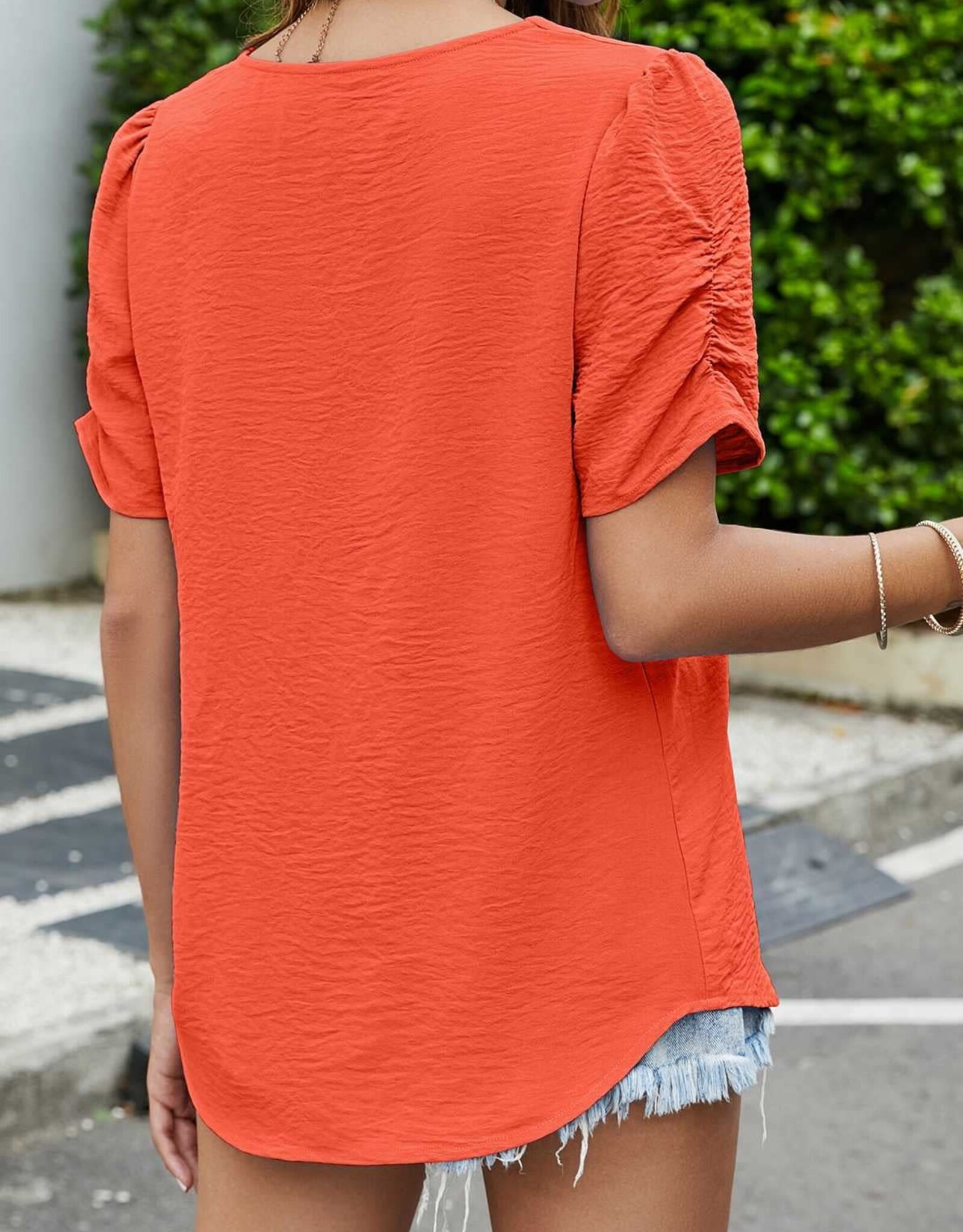 - Orange Textured V Neck Short Puff Sleeve Top