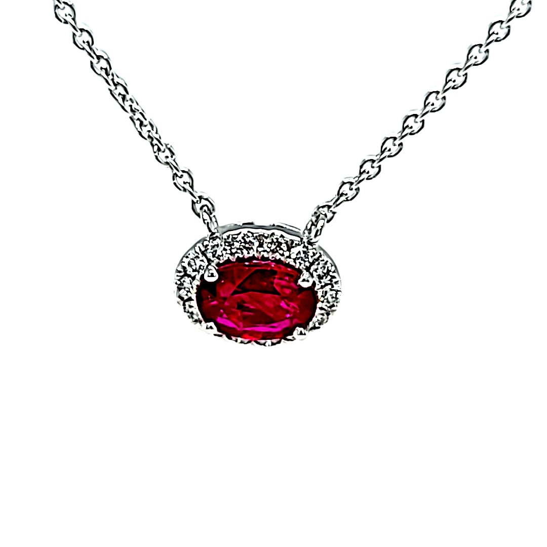 14KW .55CT Ruby Halo Pendant .10tw Dia