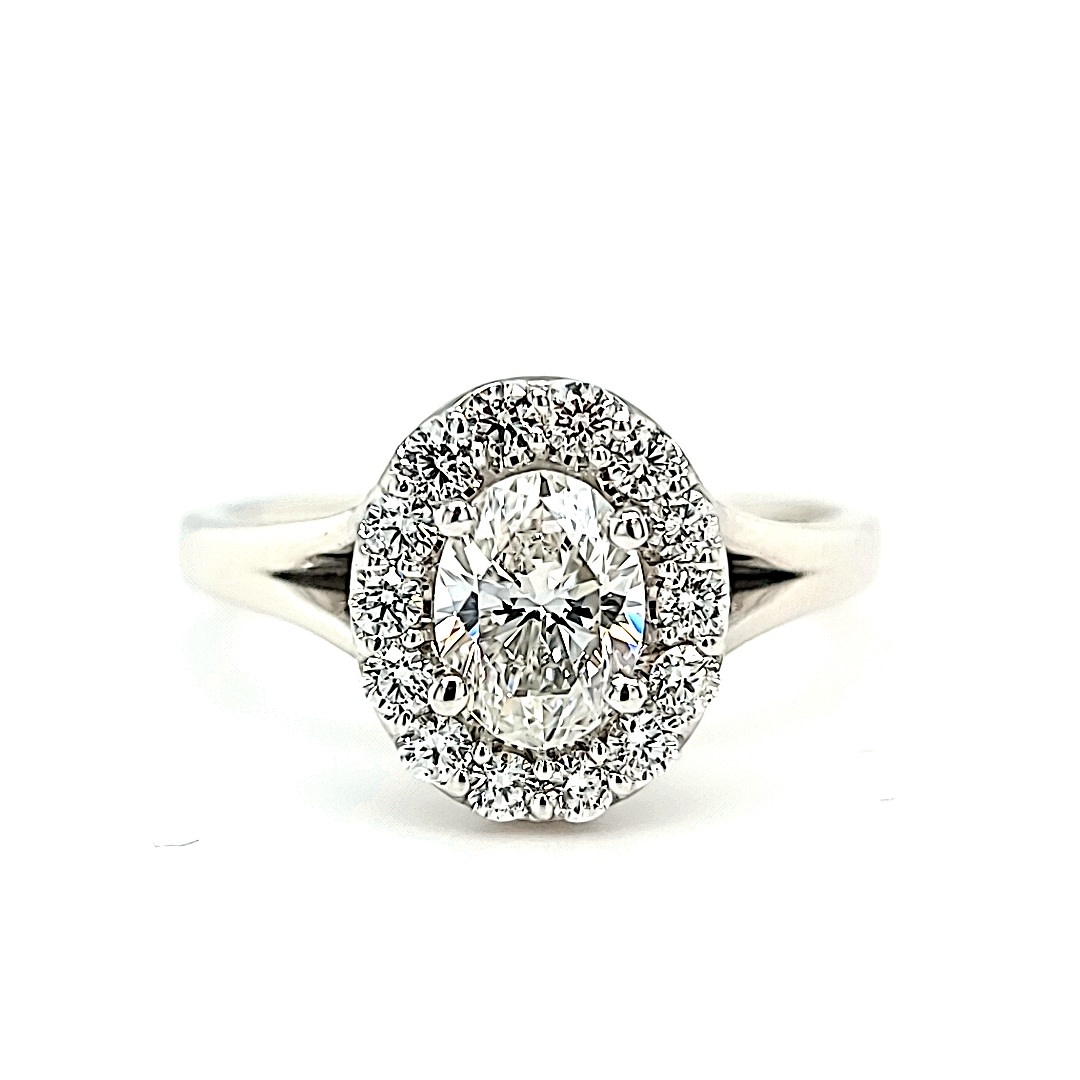 18KW .74 E VVS2 Oval Halo Engagement Ring