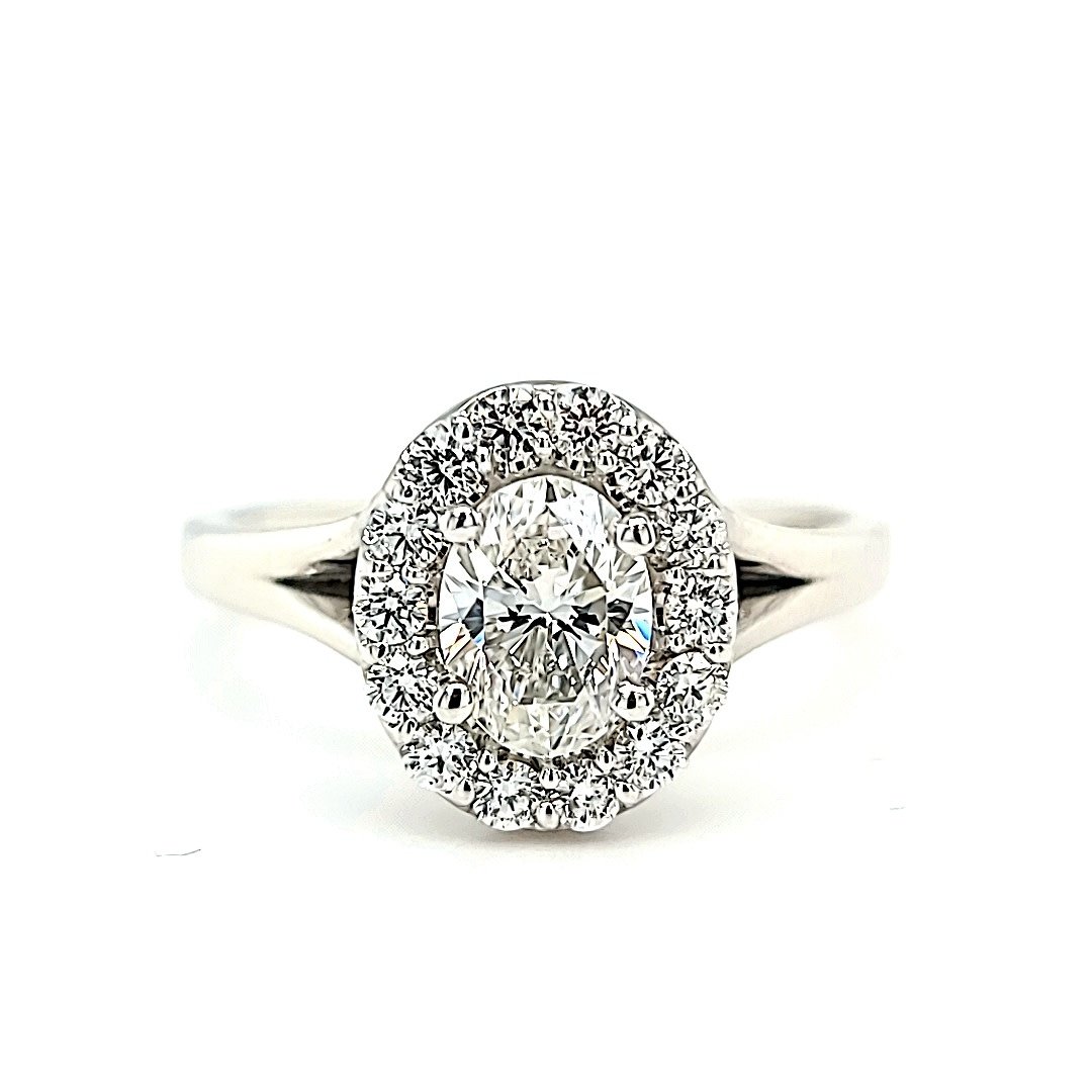 18KW .74 E VVS2 Oval Halo Engagement Ring