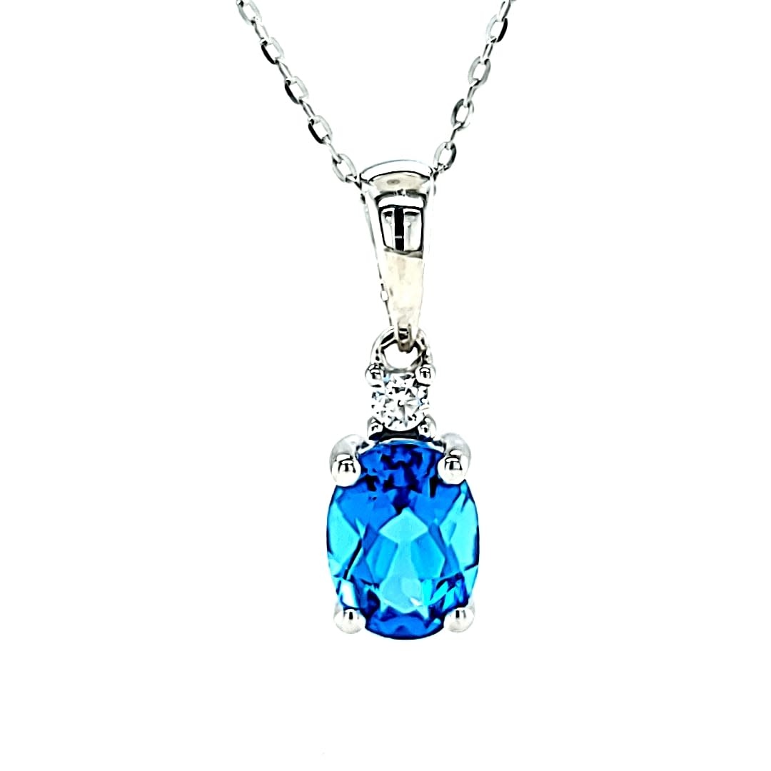 Cirari 14KW 1.41 Swiss Blue Topaz and Diamond Pendant .04TW Cirari 14KW 1.41 Swiss Blue Topaz and Diamond Pendant .04TW