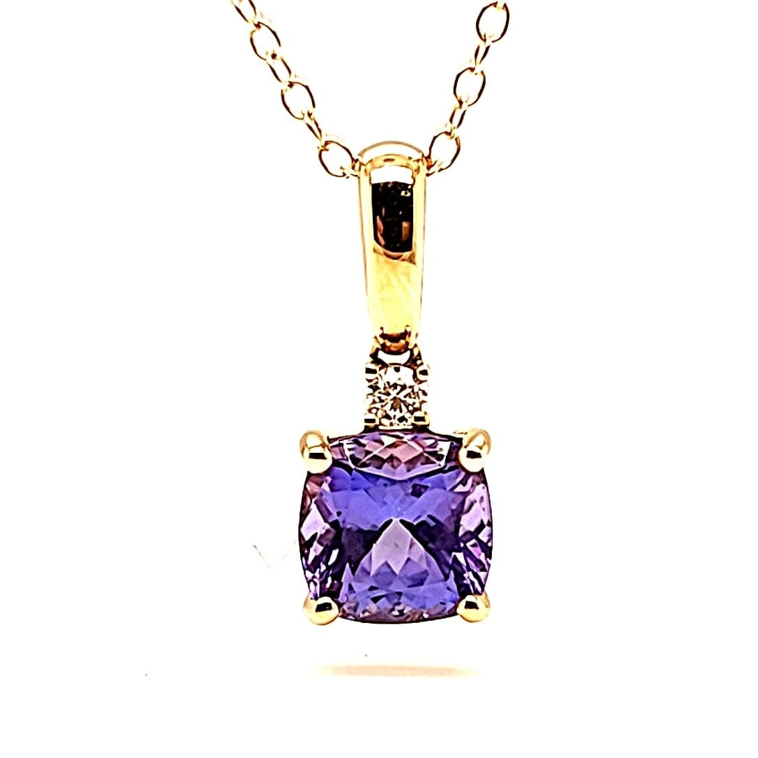 Cirari 14KY Cushion Cut Tanzanite Pendant with a Diamond Accent Cirari 14KY Cushion Cut Tanzanite Pendant with a Diamond Accent
