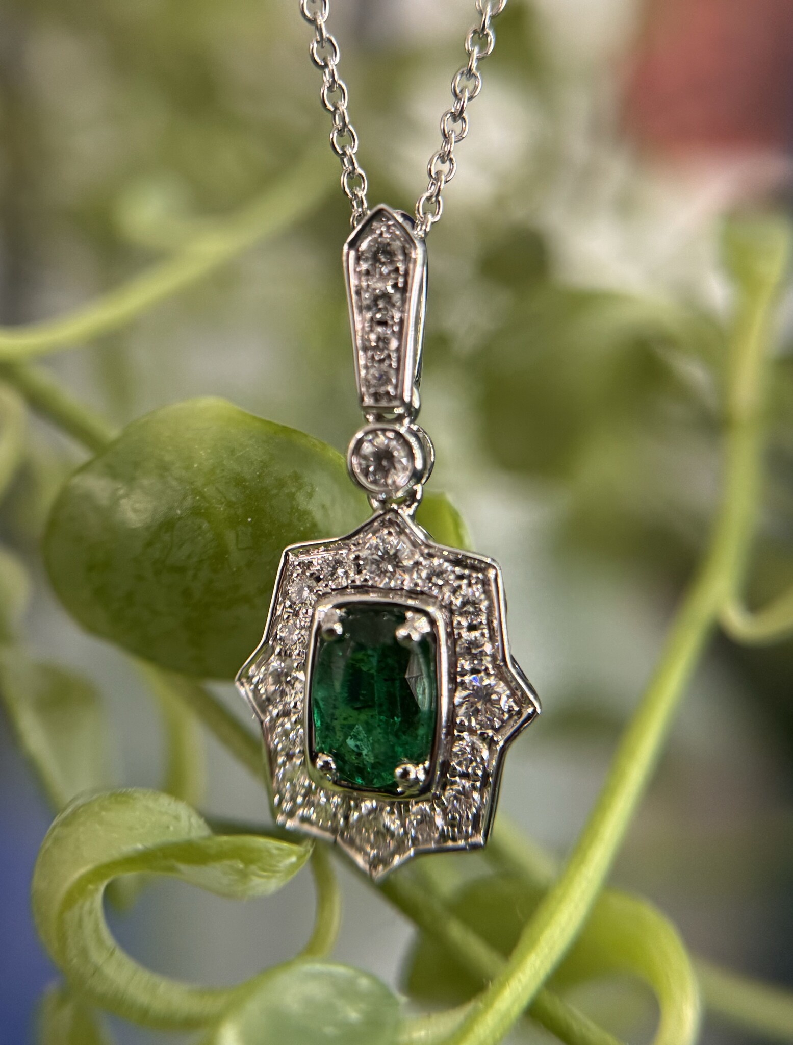 14KW .47CT Emerald Halo Pendant