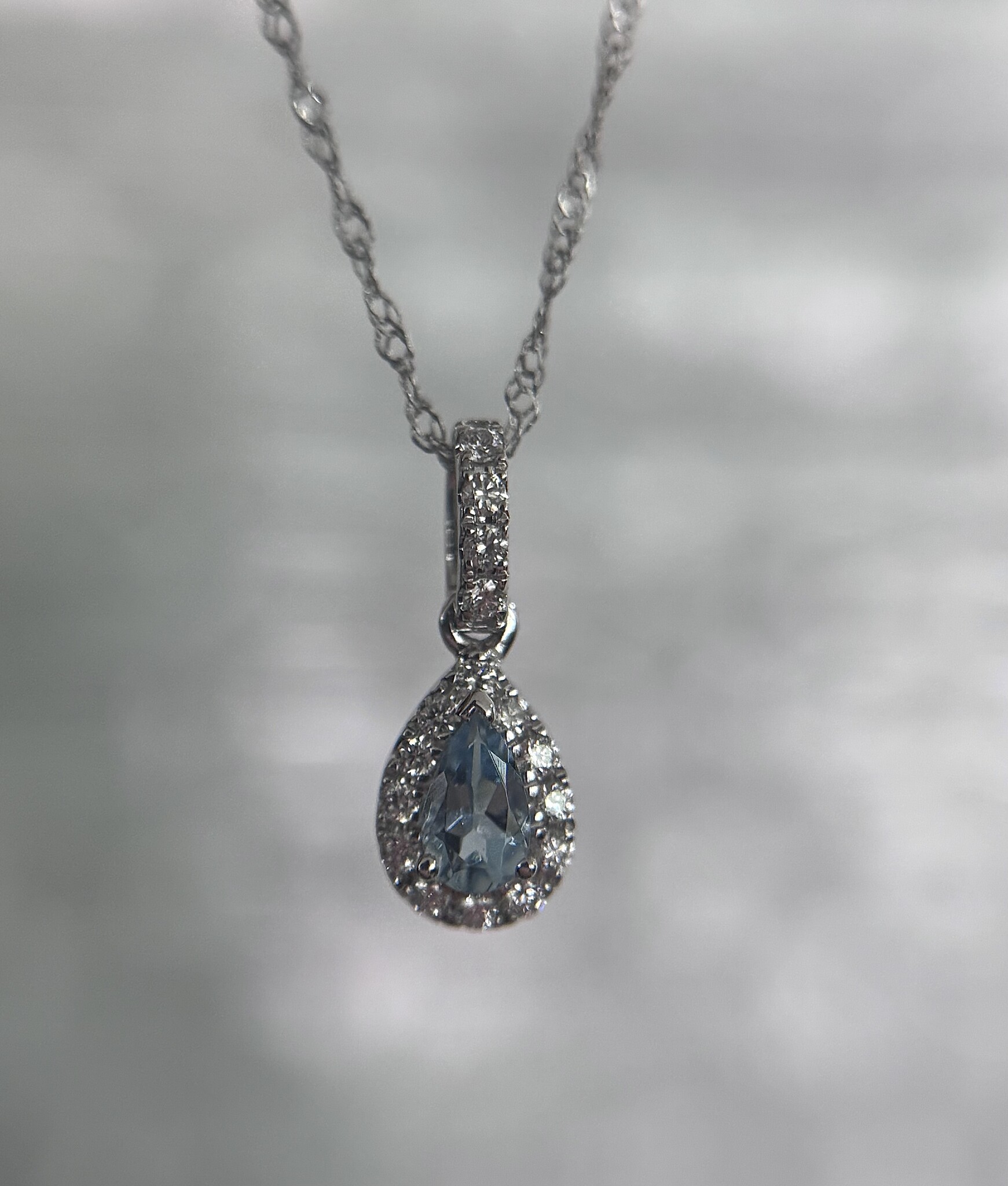 14KW Pear Aquamarine Halo Pendant .16CT