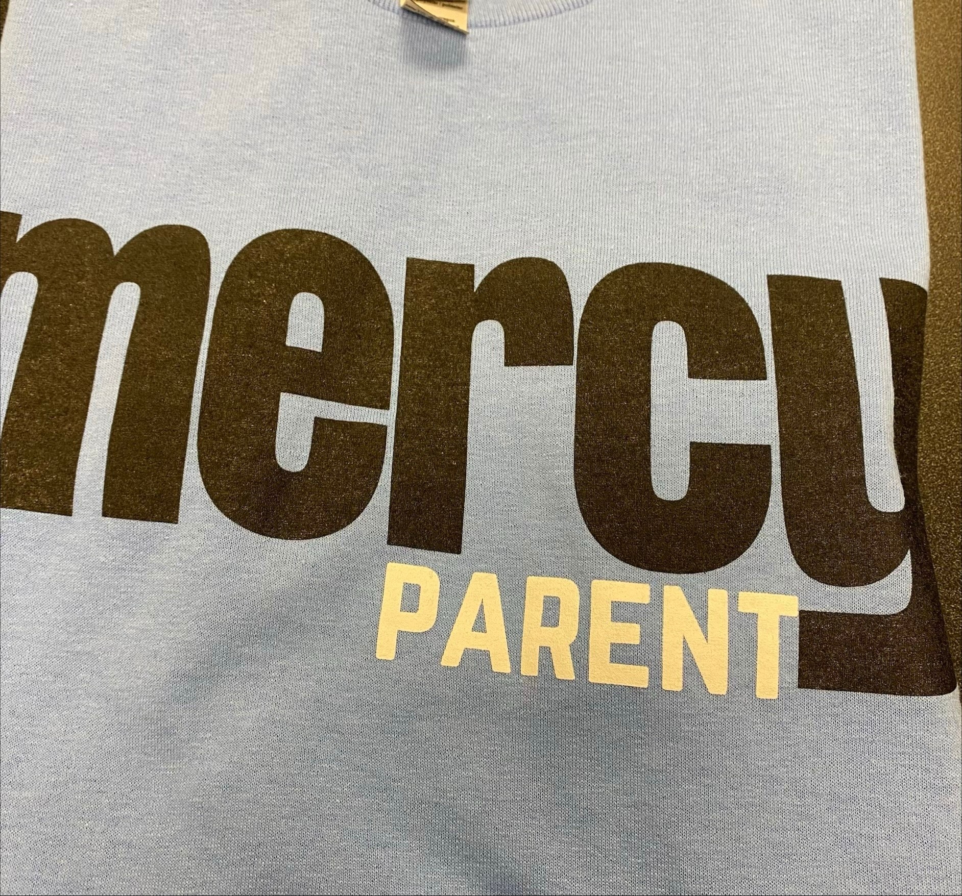 Lt Blue Mercy parent Tshirt SM - Mercy Academy Campus Store