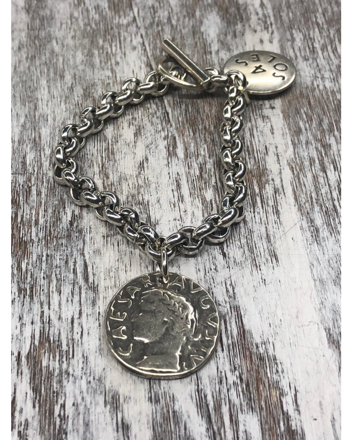 4 soles brazalete