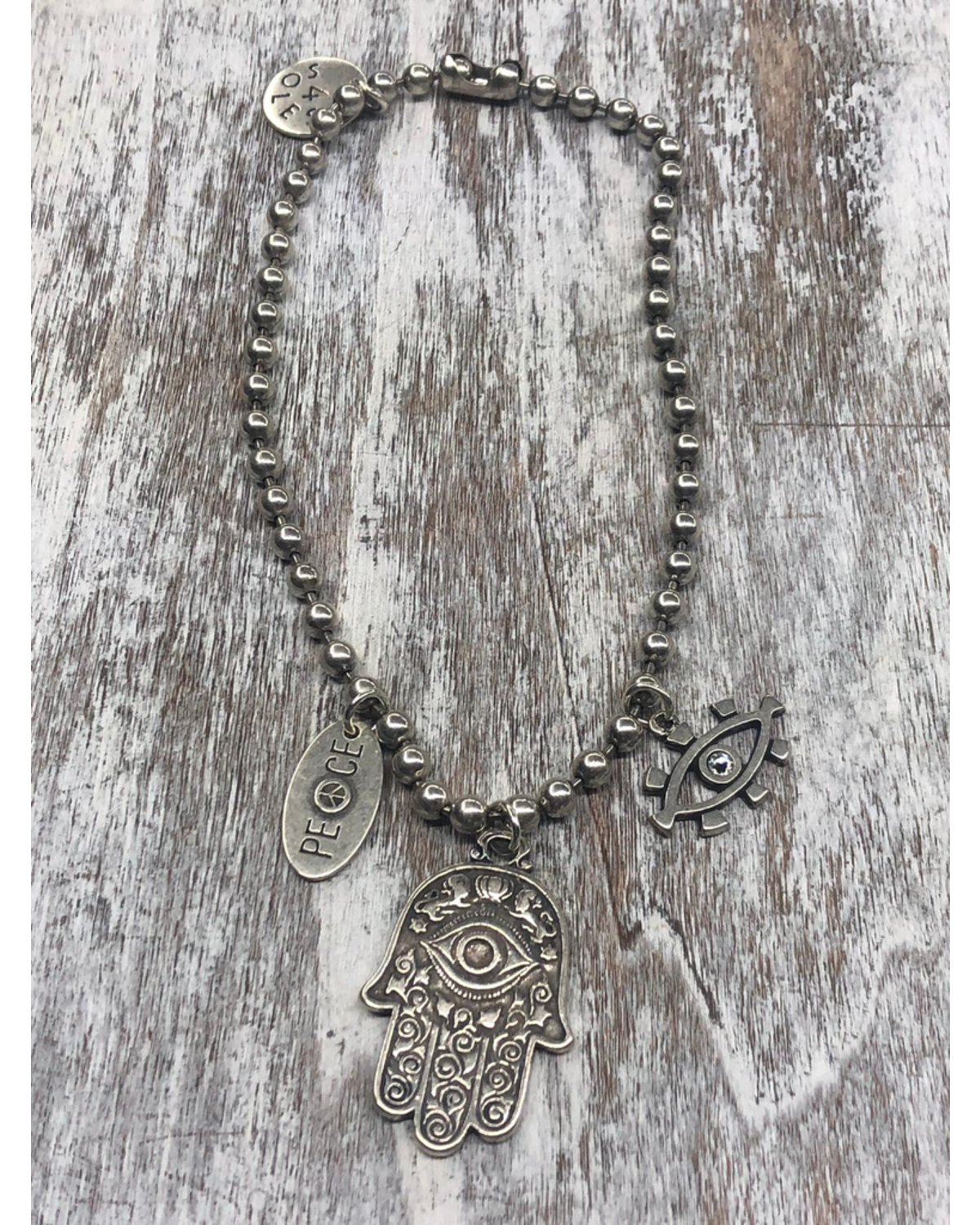 4 Soles Hamsa Necklace